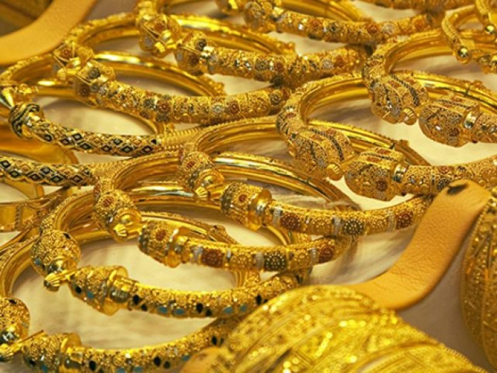 Giá vàng tăng vọt sau tin ông Trump sớm xuất viện - 1