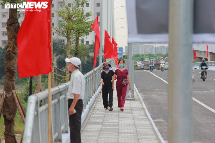 Hà Nội thông xe cầu vượt hồ Linh Đàm sau gần 1 năm thi công - 14