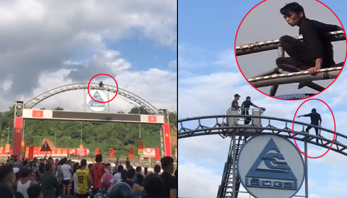 Giải cứu nam thanh niên ngáo đá trèo lên cổng chào ở Lào Cai - 1