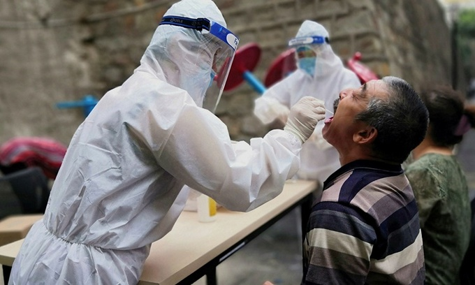 COVID-19: Thế giới có hơn 4.000 người chết, thêm ổ dịch mới ở Trung Quốc - 1