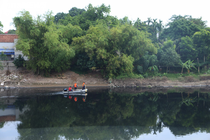 Đưa nghi phạm sát hại nữ sinh Học viện Ngân hàng thực nghiệm hiện trường - 6