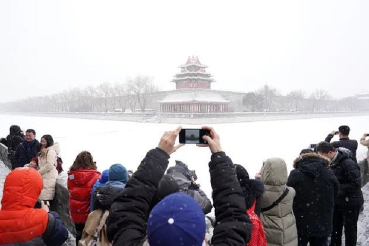 Tuyết đầu mùa phủ trắng trời nhiều nơi ở Trung Quốc - 2