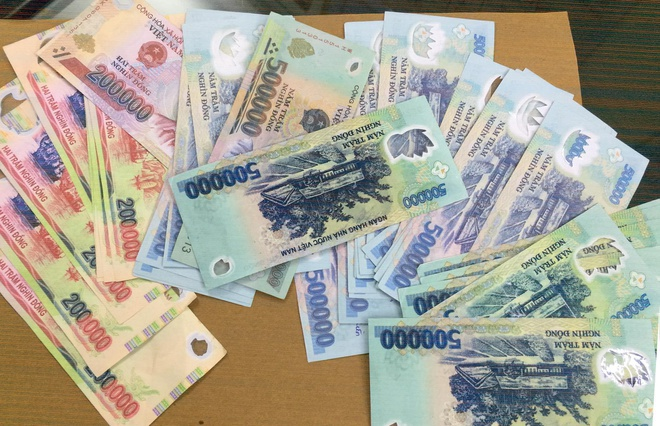 Rao bán tiền giả tràn lan - 2