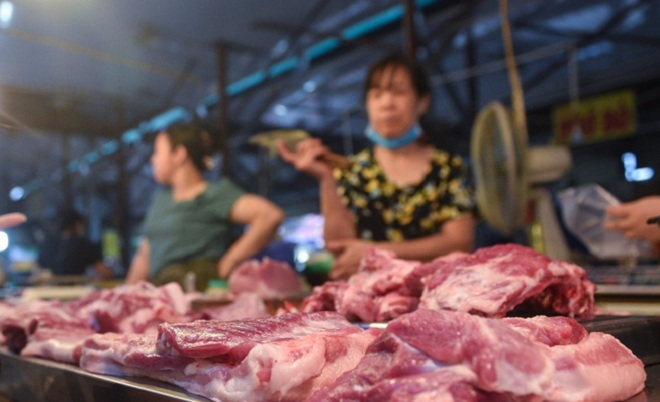 Gần Tết Nguyên đán, giá thịt lợn lại 'nóng' - 2
