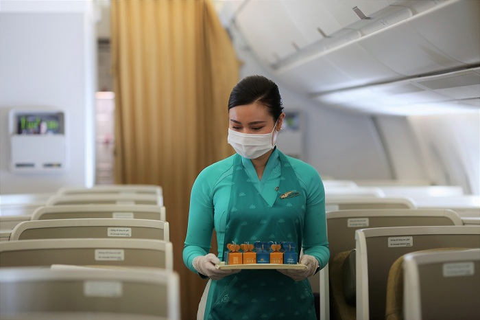 Hành khách Vietnam Airlines bất ngờ nhận quà Giáng sinh trên không - 12