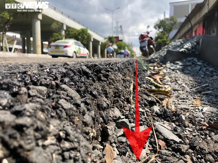 TP.HCM: Đường Nguyễn Hữu Cảnh tôn cao lên hơn 1m, dân lo sợ nước ngập vào nhà - 2