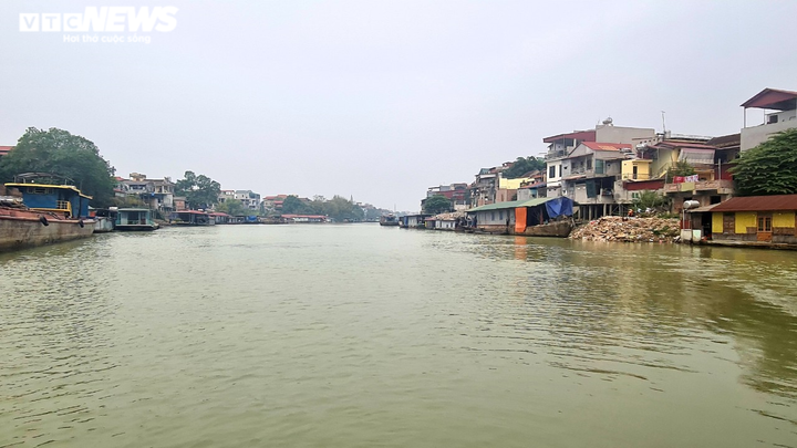 Độc đáo những bức tường cổ xây bằng mảnh chum, tiểu sành ở làng Thổ Hà - 2