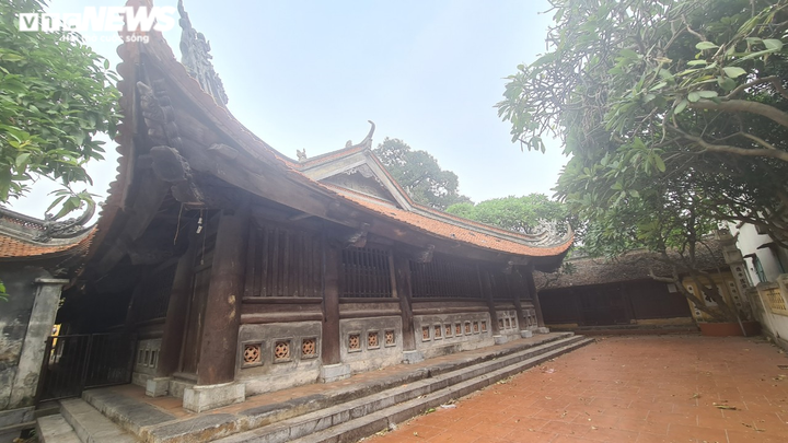 Độc đáo những bức tường cổ xây bằng mảnh chum, tiểu sành ở làng Thổ Hà - 3