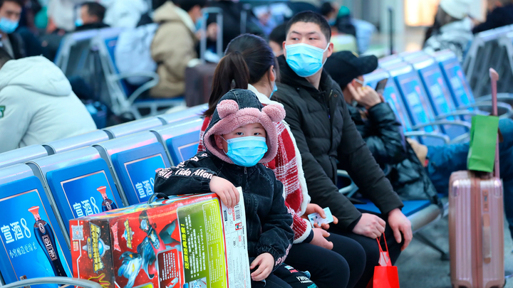 Trung Quốc: 'Xuân vận' làm gia tăng nguy cơ lây lan COVID-19 - 1