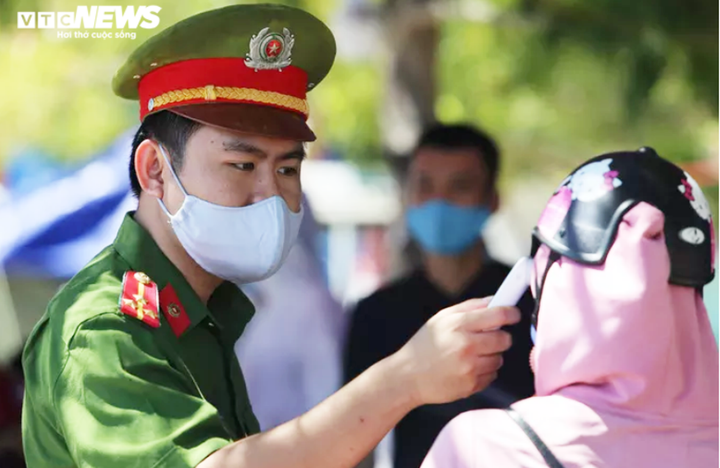 Người từ vùng dịch COVID-19 về quê đón Tết cần lưu ý gì? - 2