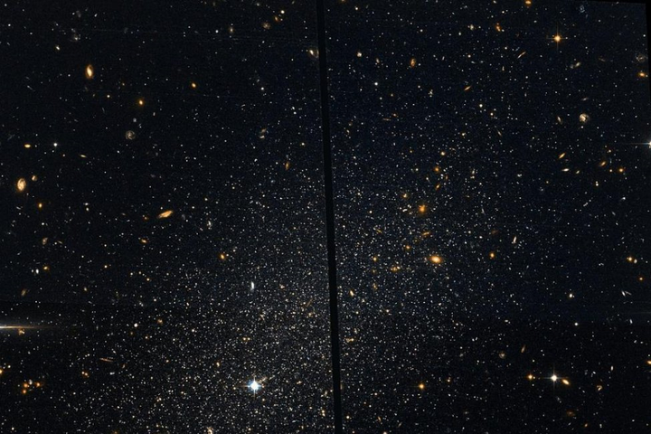 Thiên hà 'làm thịt' đồng loại, đá văng các sao của nạn nhân ra vùng 'ngoại ô' - 1