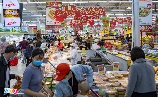 Ảnh: Chen chúc mua sắm trong ngày thứ bảy cuối cùng của năm Canh Tý - 2