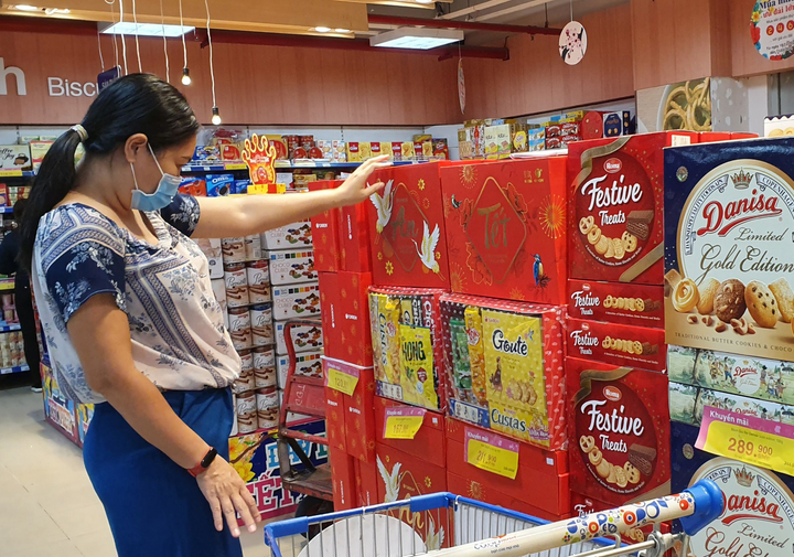 Sức mua tăng, khuyến mãi đậm tại siêu thị - 1