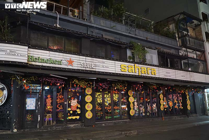 Ảnh: Phố đi bộ Bùi Viện nhộn nhịp nhất TP.HCM đìu hiu vì dịch COVID-19 - 2