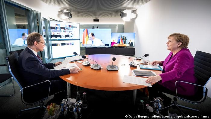 Thủ tướng Đức Merkel bị chỉ trích vì các biện pháp chống dịch - 1