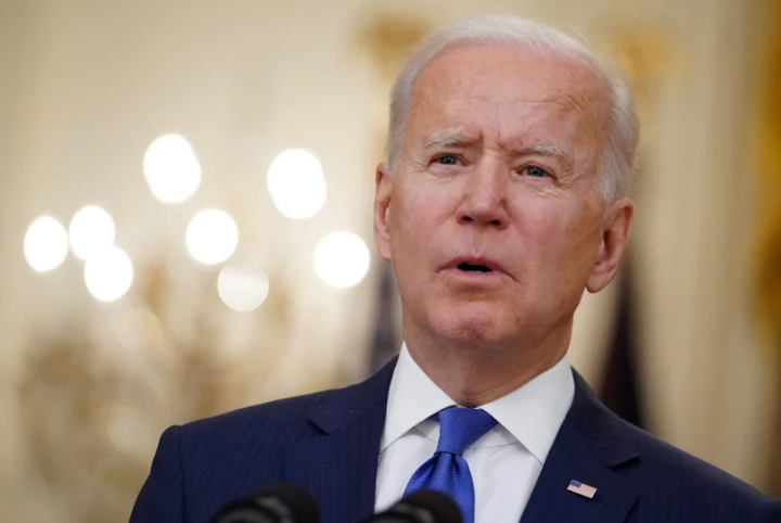 50 ngày cầm quyền đầu tiên của Biden đối lập hoàn toàn với Trump - 1