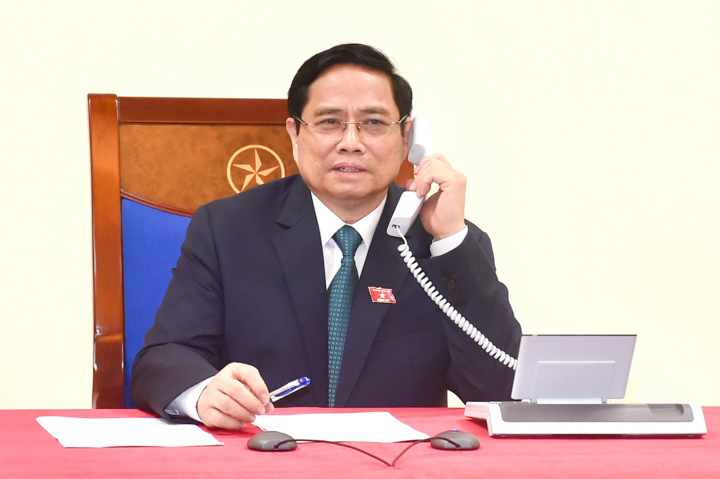 Thủ tướng Phạm Minh Chính điện đàm với Thủ tướng Lào - 1