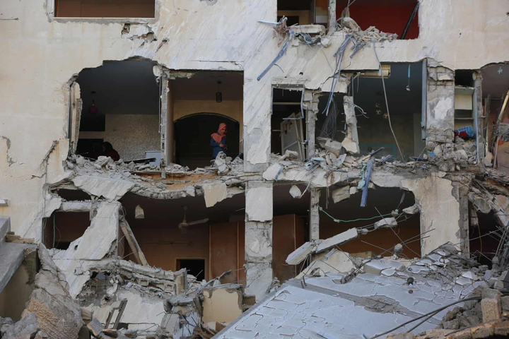 Ảnh: Xung đột leo thang, dải Gaza chìm trong khói lửa - 14