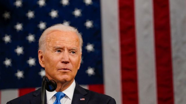 Ông Biden: Mỹ chia sẻ vaccine không có ràng buộc ân huệ hay nhượng bộ - 1