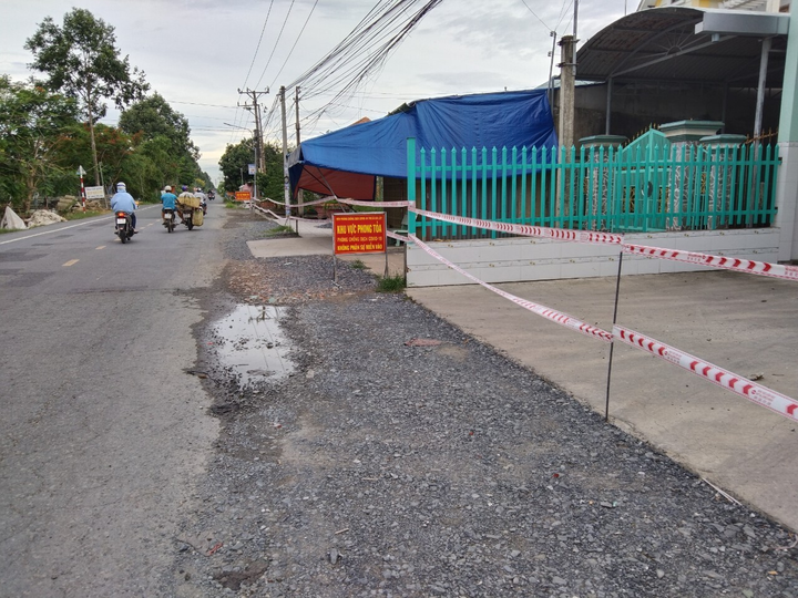 Tiền Giang: Người bán thịt lợn nghi mắc COVID-19, cả chợ bị phong tỏa - 1