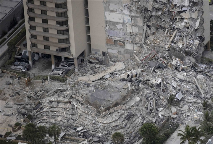 Quân đội Mỹ bác tin vụ nổ thử độ bền tàu sân bay làm sập chung cư 12 tầng - 2