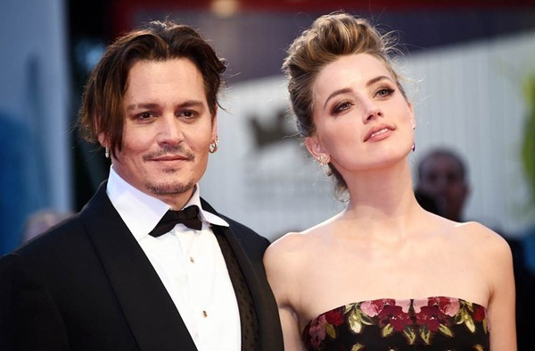 Fan ngỡ ngàng khi Amber Heard bất ngờ khoe đã làm mẹ - 1