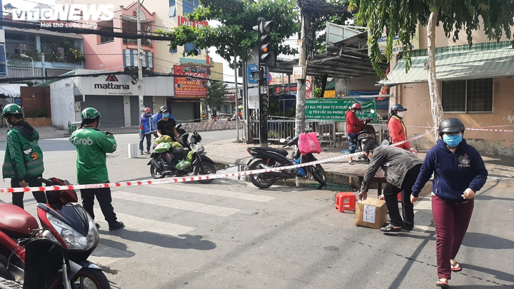 TP.HCM đề xuất tiêm vaccine cho shipper, người trong cuộc nói gì? - 3