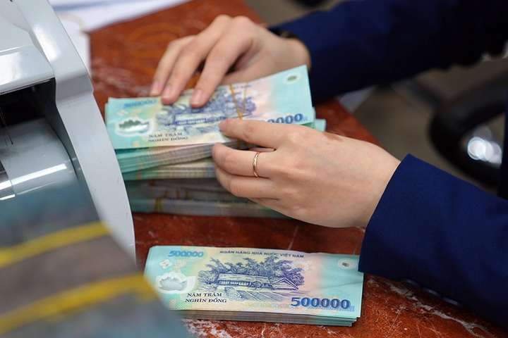 Cần cởi mở chính sách cho đại lý ngân hàng - 1