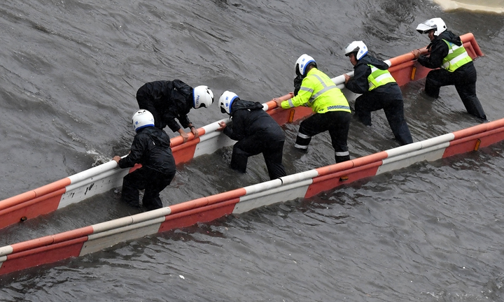 Mưa lũ kỷ lục ở Trung Quốc: Hoạt động nhiều tập đoàn đa quốc gia bị đứt đoạn - 1