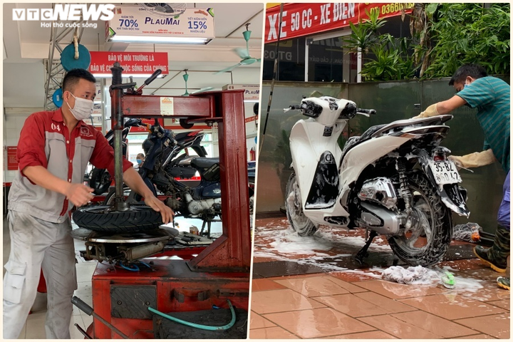 Khách Hà Nội xếp hàng chờ sửa xe, mua phở trong ngày đầu hàng quán mở cửa lại - 1