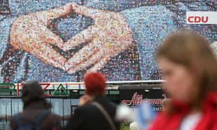 Cử chỉ tay nổi tiếng trở thành thương hiệu của bà Angela Merkel - 3