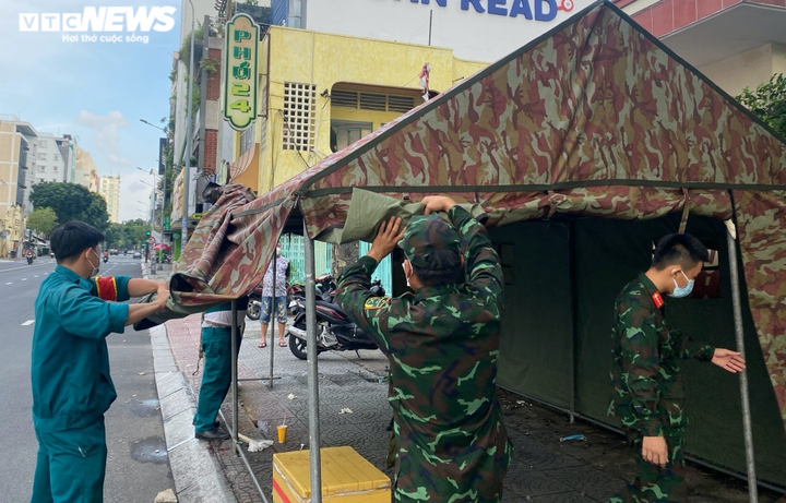 Ảnh: TP.HCM gỡ toàn bộ chốt kiểm soát dịch trong nội thành - 5