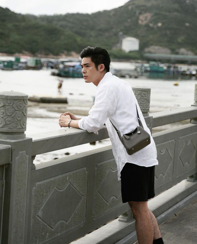 Vì sao nhiều chàng trai châu Á 'nghiện' dùng túi xách của nữ? - 3