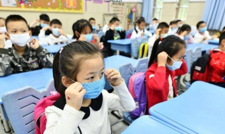Một giáo viên mắc COVID-19, 18 trường học ở Trung Quốc phải đóng cửa - 1