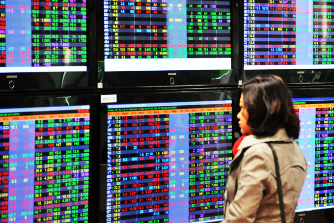 Thấy gì từ phiên thanh khoản kỷ lục 52.000 tỷ đồng trên sàn chứng khoán? - 1