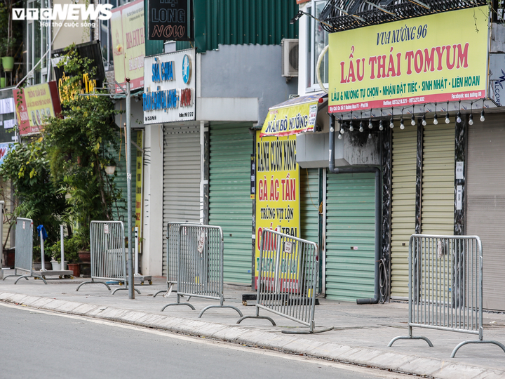 Số ca COVID-19 tăng kỷ lục, Hà Nội phong tỏa hàng loạt quán phở nổi tiếng - 7