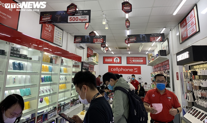 Ảnh: Khuyến mại tràn ngập phố Hà Nội, cơ hội tiết kiệm cho người tiêu dùng - 8