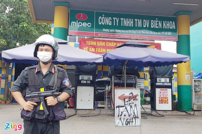 Cảnh sát niêm phong cây xăng liên quan đường dây buôn bán xăng lậu ở Đồng Nai - 1