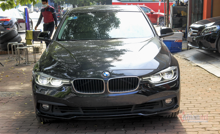 Xe sang BMW 320i đi 5 năm mất giá 700 triệu đồng - 2