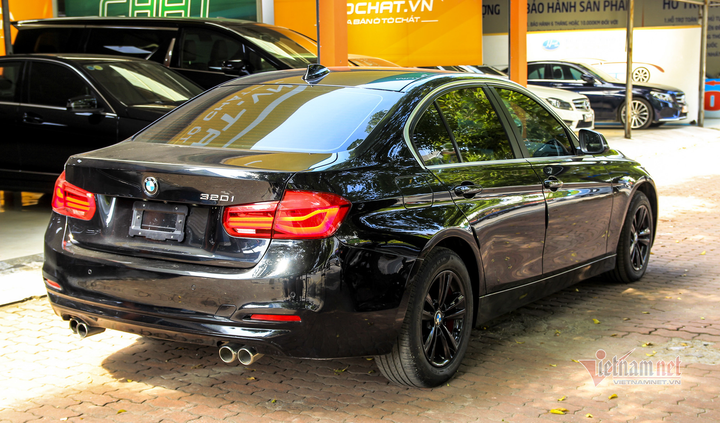 Xe sang BMW 320i đi 5 năm mất giá 700 triệu đồng - 7