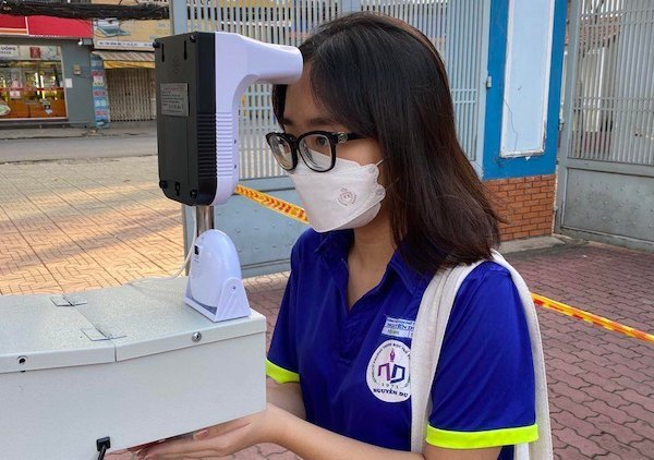 Trường học TP.HCM lo chi phí mua kit test nhanh trước ngày mở cửa - 1