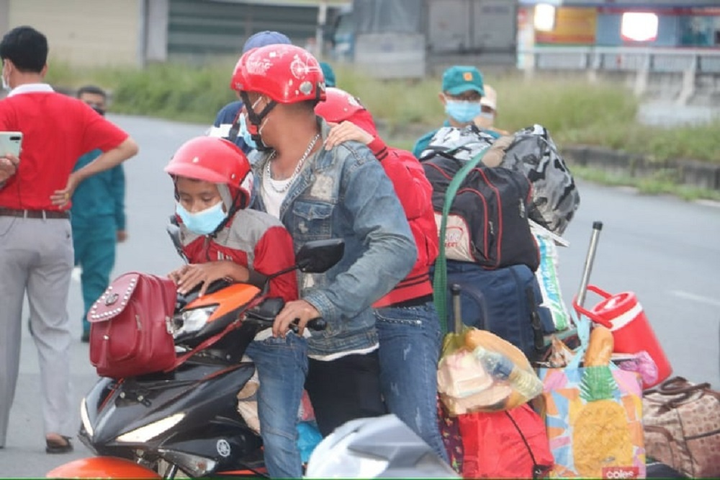 Các địa phương quy định thế nào đối với người dân về quê ăn Tết? - 4