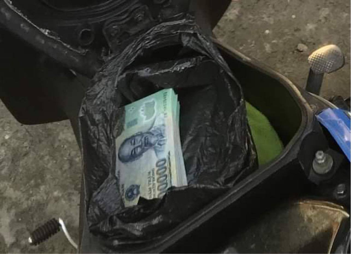 Thu giữ lựu đạn, ma tuý trong xưởng sản xuất tiền giả ở TP.HCM - 2