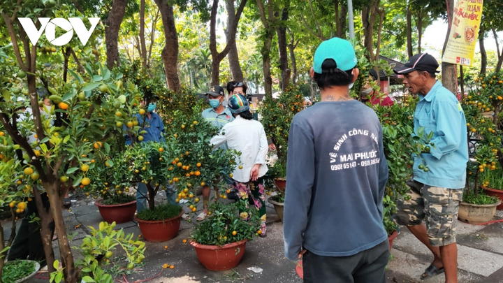 Chợ hoa Xuân ở TP.HCM nghỉ bán, dọn dẹp để trả mặt bằng - 2