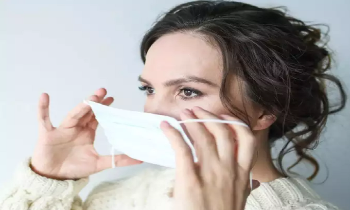 Các triệu chứng của COVID-19 có nhẹ hơn khi bị tái nhiễm? - 1