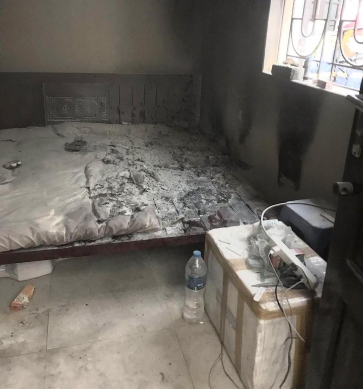 Nam thanh niên cùng công an cứu cháu bé kẹt trong đám cháy - 1