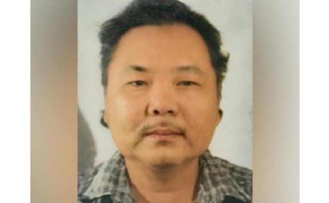 Truy tìm người đàn ông trong vụ lừa đảo mua bán cổ phiếu ở Hà Nội - 1