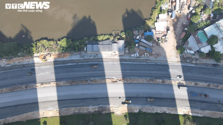 Ảnh: Cận cảnh đại lộ Nguyễn Văn Linh gồm 10 làn xe sắp hoàn tất - 2