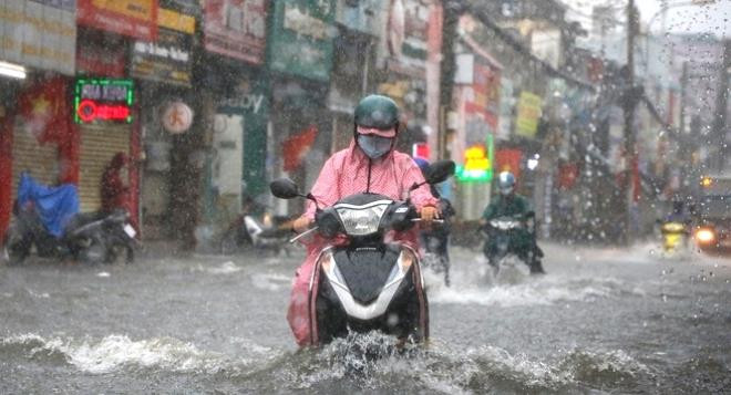 Cuối tuần không khí lạnh tràn về, miền Bắc mưa to, trời trở rét - 1