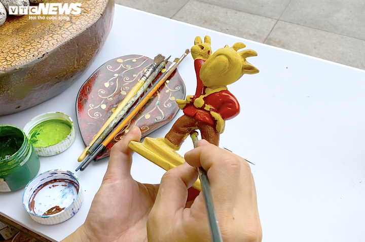 500.000 đồng một tượng linh vật SEA Games 31 làm bằng gỗ mít - 10